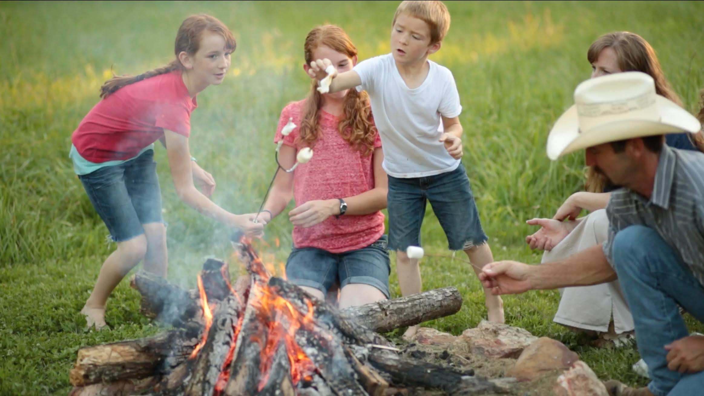 Family by campfire